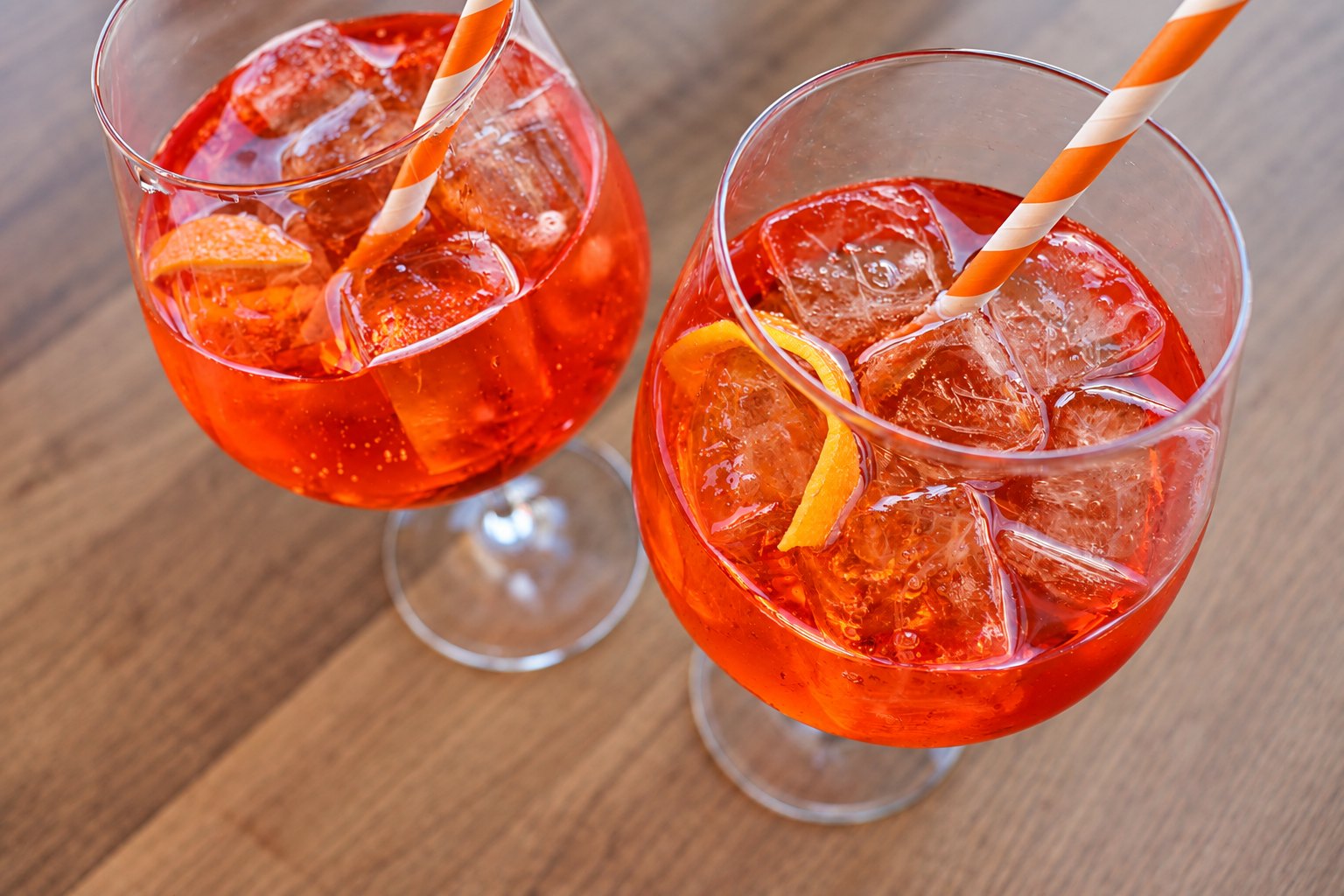 Two orange spritz cocktails